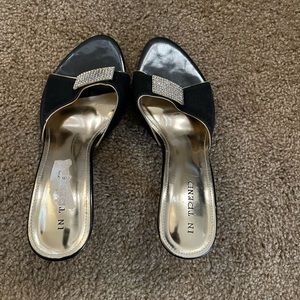 In good condition black and gold heels size 36(us 5.5)